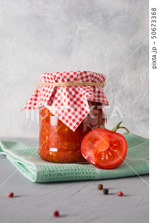Vegetable sauce adjika with tomatoes, garlic. Vegetable sauce adjika with tomatoes, garlic. 50673368