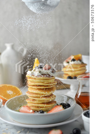 Beautiful pancakes with Sifting sugar powder. Beautiful pancakes with Sifting sugar powder. 50673576
