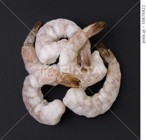 A bunch of raw frozen prawn A bunch of raw frozen prawn 50676822