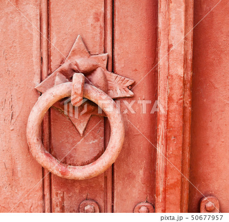 Old metal door knocker 50677957