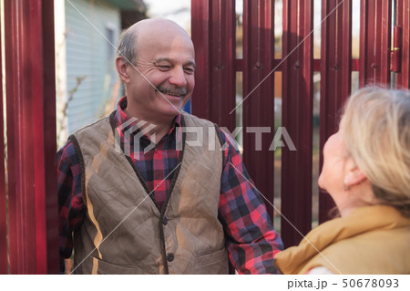 Getting to know the neighbors at the country houses in village 50678093