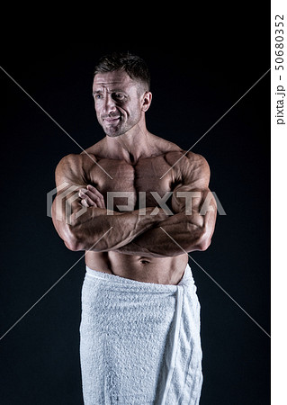 Bodybuilder showing muscles. Sexy man in bath Bodybuilder showing muscles. Sexy man in bath 50680352