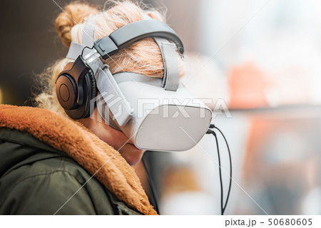 Woman with virtual Reality Glasses 50680605