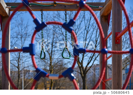 Sports rings on the horizontal bar on the street Sports rings on the horizontal bar on the street 50680645