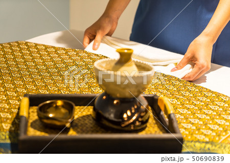massage and spa room with hand of massager in warm massage and spa room with hand of massager in warm 50690839