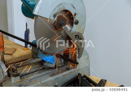 Circular electro saw cutting iron steel railings 50696491