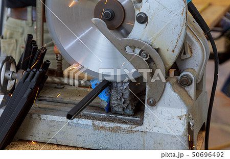 The construction worker are cutting metal steel 50696492