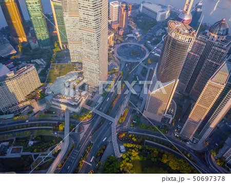 Aerial view of a roundabout with skyscraper and Aerial view of a roundabout with skyscraper and 50697378