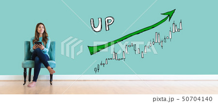 Market up trend chart with young woman Market up trend chart with young woman 50704140