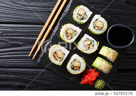 Japanese rolls wrapped in avocado with omelet, Japanese rolls wrapped in avocado with omelet, 50705570