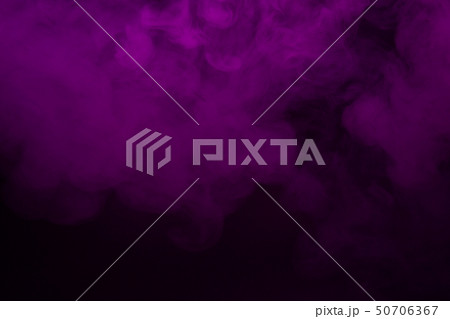 Colorful smoke close-up on a black background 50706367