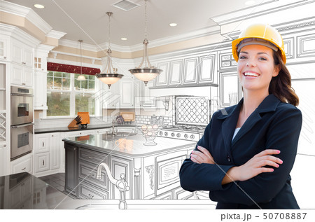 Smiling Female Contractor Over Kitchen Drawing Smiling Female Contractor Over Kitchen Drawing 50708887