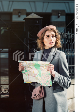 Cute young beautiful curly confused caucasian Cute young beautiful curly confused caucasian 50709634
