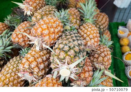 group of pineapple fruit at traditional 50710079