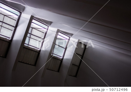Shadow And Light Through Blinds Window On Wall. Shadow And Light Through Blinds Window On Wall. 50712496