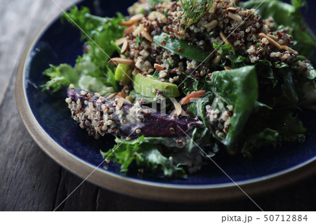 Quinoa salad with vegetable on wooden table 50712884