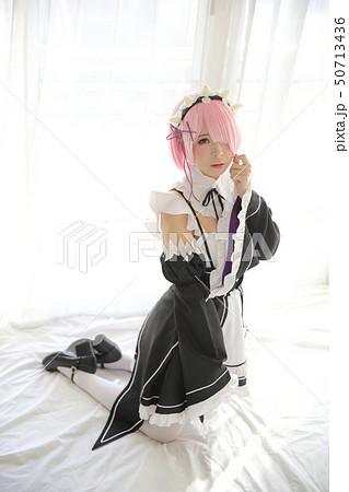 Portrait of Japan anime cosplay woman , white japanese maid in white tone room 50713436