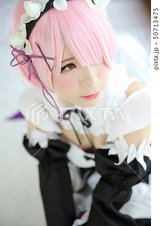 Portrait of Japan anime cosplay woman , white japanese maid in white tone room Portrait of Japan anime cosplay woman , white japanese maid in white tone room 50713475