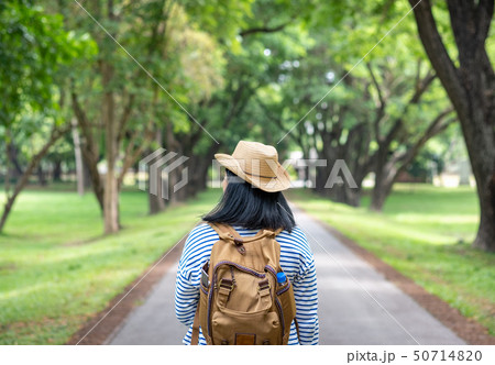 Happy young traveler woman backpacker travel in 50714820