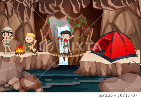 Kid scouts exploring cave 50715707