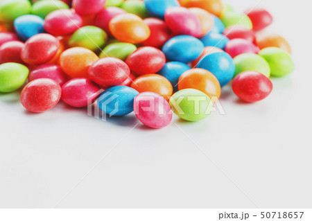 A rainbow of color from multicolored candies A rainbow of color from multicolored candies 50718657