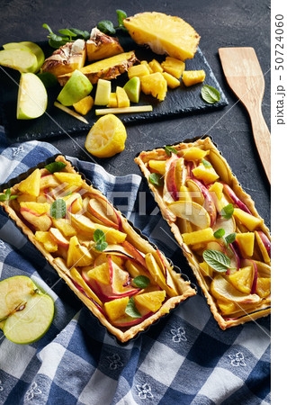 pineapple and apple sweet tart, vertical view pineapple and apple sweet tart, vertical view 50724060