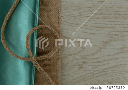Textile and rope on a table Textile and rope on a table 50725850