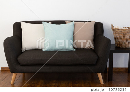 Cushions arranged on sofa Cushions arranged on sofa 50726255