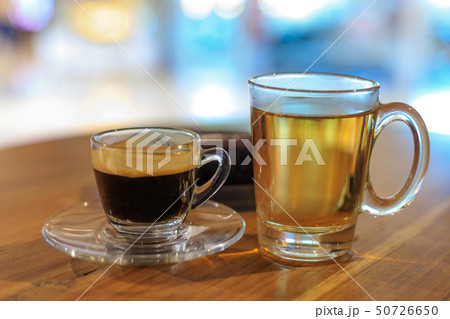 Hot black coffee and tea. Hot black coffee and tea. 50726650