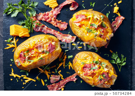 close-up of Loaded Potatoes on a plate close-up of Loaded Potatoes on a plate 50734284