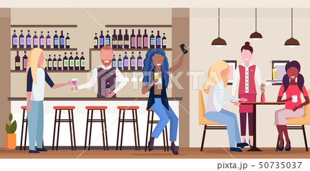 african girl taking selfie photo on smartphone camera mix race people relaxing in bar drinking 50735037