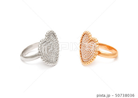Diamond rings isolated on white background. Rings with diamonds in shape of heart. Luxury jewelry 50738036
