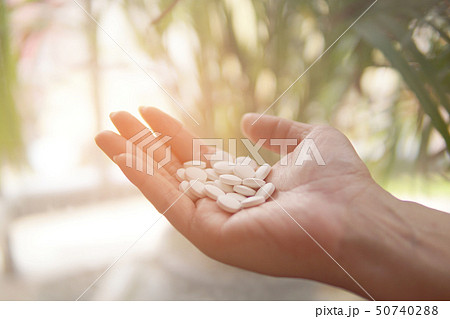 Group of Medicine pills in the hand. Group of Medicine pills in the hand. 50740288