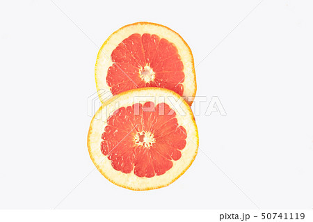Sliced red grapefruit isolated on white background 50741119