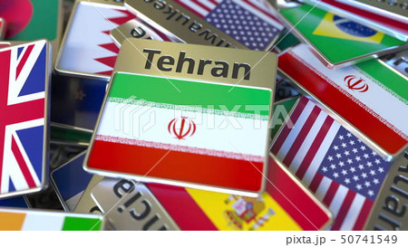Souvenir magnet or badge with Tehran text and national flag among different ones. Traveling to Iran Souvenir magnet or badge with Tehran text and national flag among different ones. Traveling to Iran 50741549