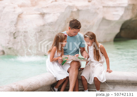 Happy kids and dad enjoy their european vacation in Italy 50742131