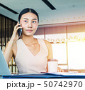 Businesswoman handling office management and lead  50742970