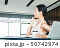 Businesswoman handling office management and lead  50742974