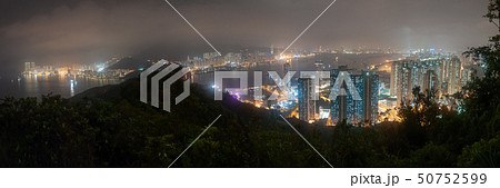 Illuminated high-rise apartment blocks in Yau Tong 50752599