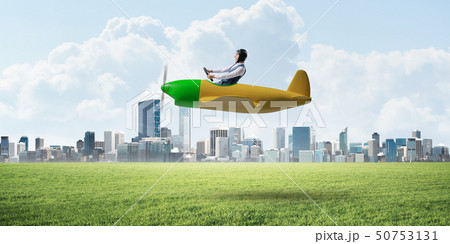 Businessman in aviator hat and goggles Businessman in aviator hat and goggles 50753131