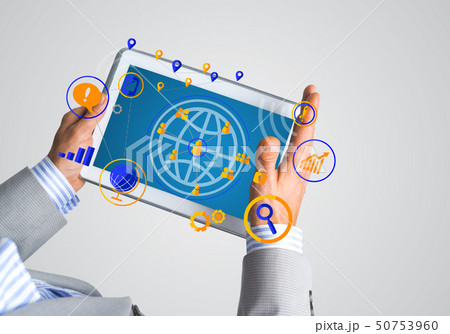 Hands of businessman holding tablet pc with social connection concept Hands of businessman holding tablet pc with social connection concept 50753960
