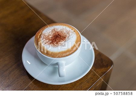 Hot coffee on wood background, black coffee. 50758858