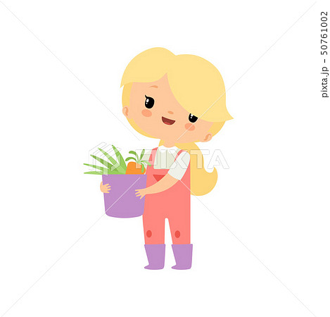 Cute Young Girl in Overalls and Rubber Boots Holding Basket Full of Fresh Vegetables, Farmer Girl Cute Young Girl in Overalls and Rubber Boots Holding Basket Full of Fresh Vegetables, Farmer Girl 50761002