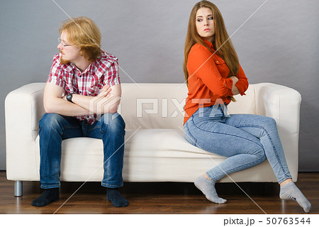Woman and man after argue on sofa Woman and man after argue on sofa 50763544