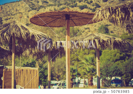 Sun parasols umbrellas on beach Sun parasols umbrellas on beach 50763985