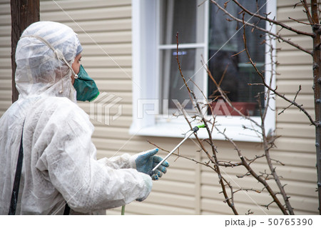 gardener trees covers pesticides gardener trees covers pesticides 50765390