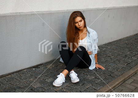 Beautiful stylish young girl in trendy casual 50766628