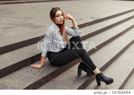 Stylish beautiful woman in fashionable clothes 50766994