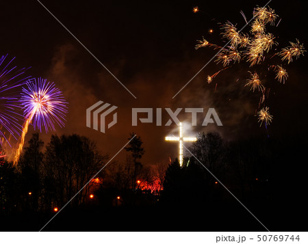 Colorful fireworks at holiday night 50769744