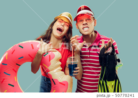 Beautiful couple isolated on blue studio background 50770241